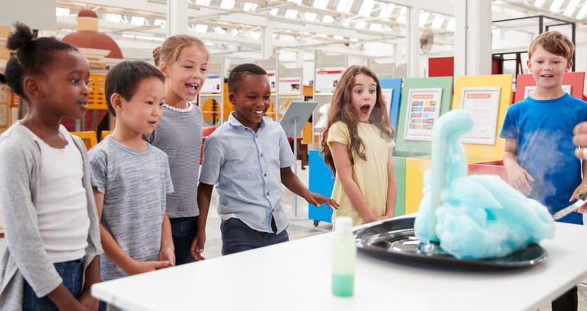 children doing a science experiment at a museum