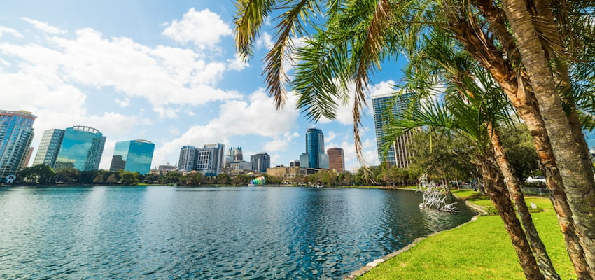 view from the lakeside trail at Lake Eola Park of the downtown Orlando skyline