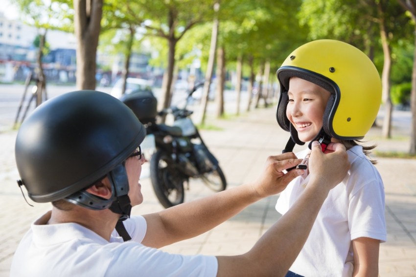 Two people practicing bike safety