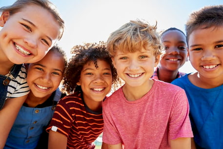 a group of kids smiling