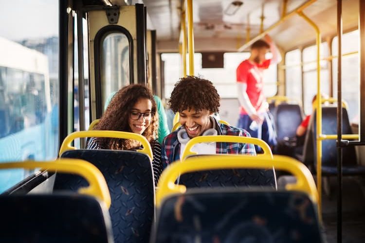 Couple sitting together on bus