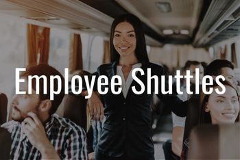 Woman in business clothes stands on a shuttle bus rental